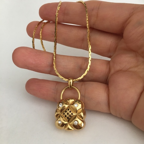 Vintage Jewelry - Gold tone diamanté openable pendant and chain